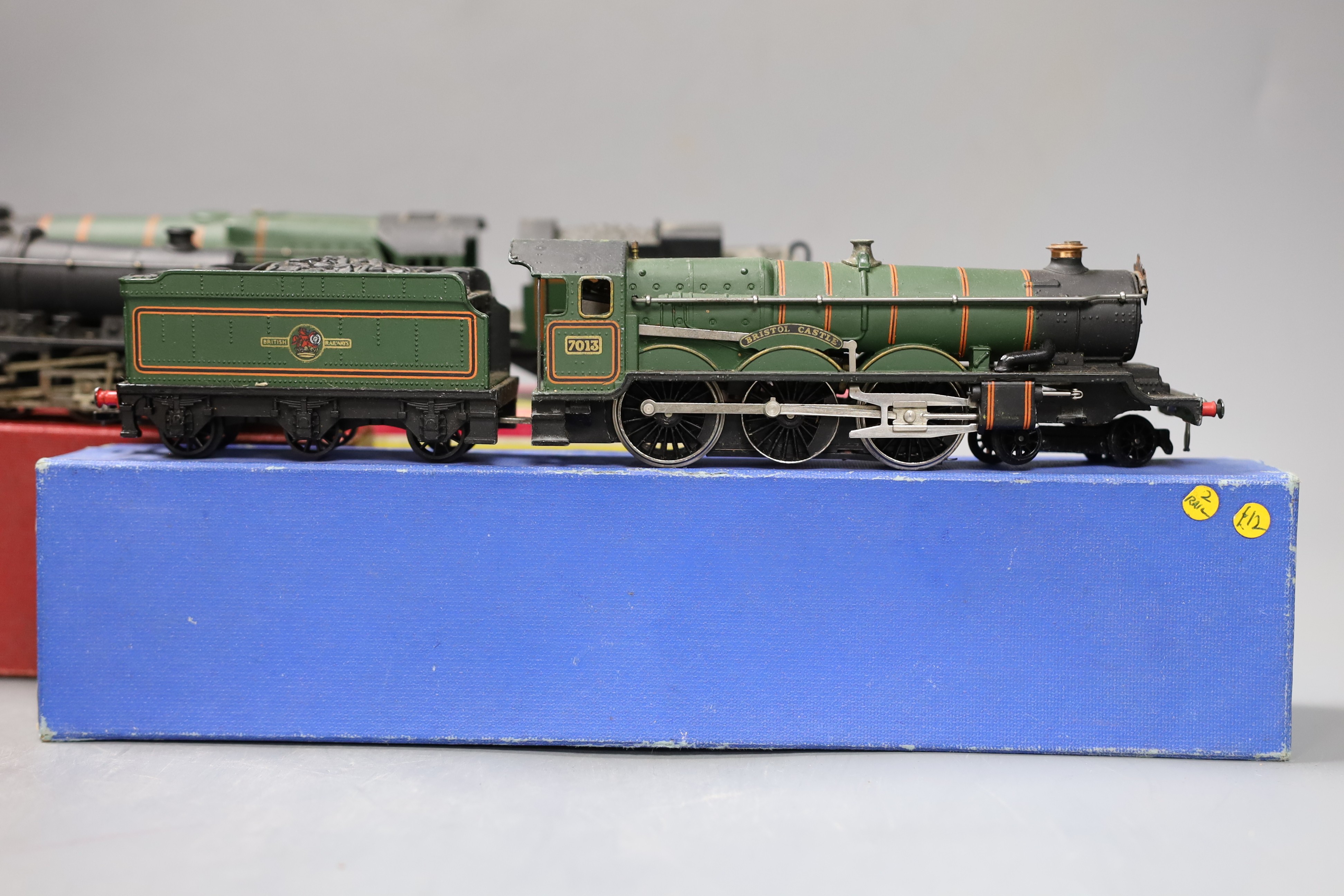 Three boxed Hornby Dublo locomotives and tenders – 2225 2-8-0 freight locomotive and tender, 2235 4-6-2 S.R. West country locomotive Barnstaple and tender and EDLT20 Bristol Castle and tender